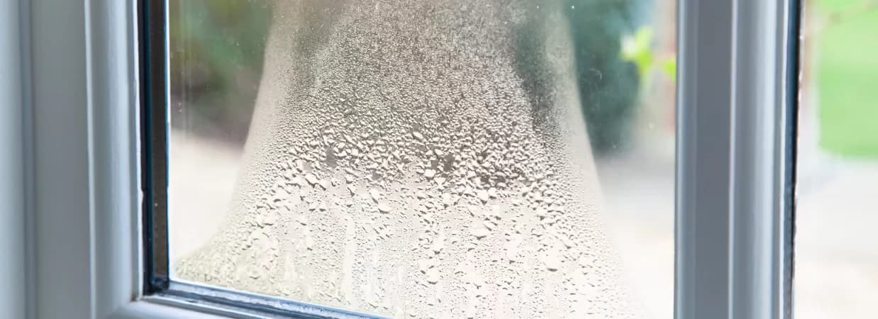 Misted double glazing with condensation between the panes